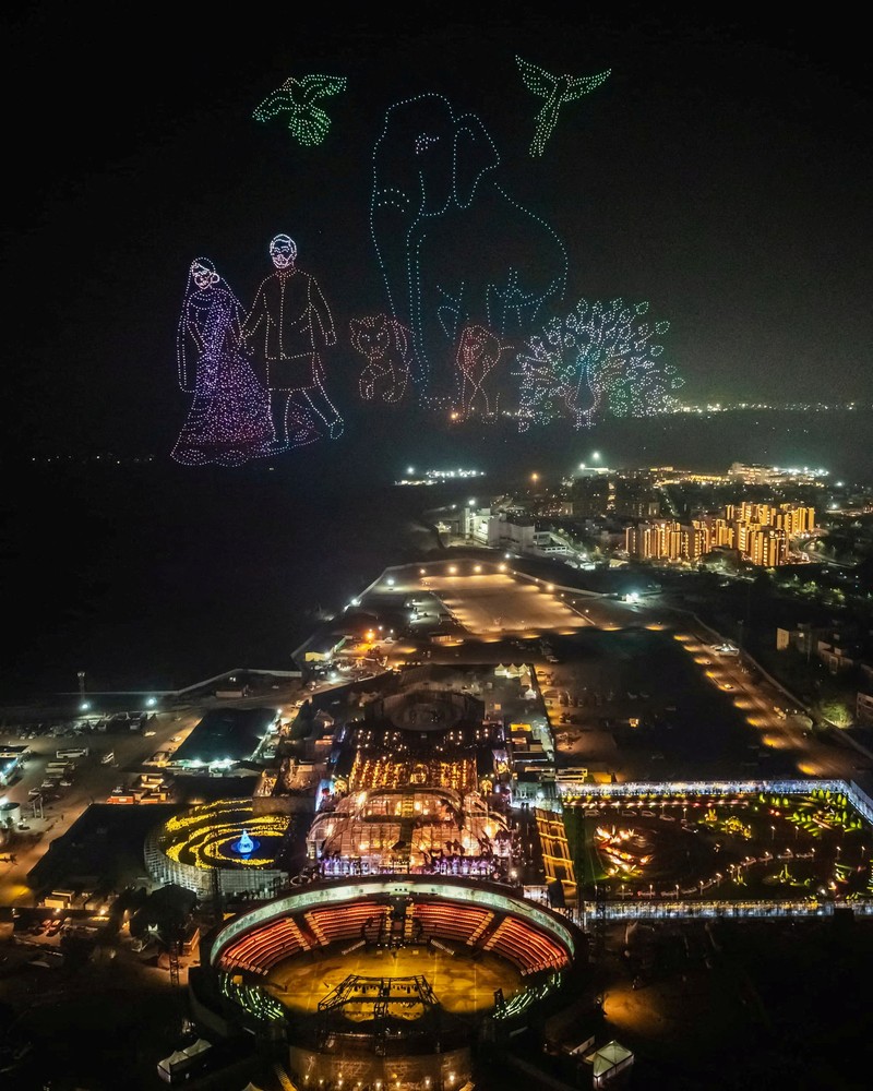 Mukesh Ambani, the Chairman of Reliance Industries, Radhika Merchant, Anant Ambani, Nita Ambani, Rihanna, Isha Piramal, Anand Piramal, Shloka Mehta Ambani and Akash Ambani react during pre-wedding celebrations of Anant and Radhika in Jamnagar, Gujarat, India, March 1, 2024. Reliance Industries/Handout via REUTERS THIS IMAGE HAS BEEN SUPPLIED BY A THIRD PARTY. NO RESALES. NO ARCHIVES.