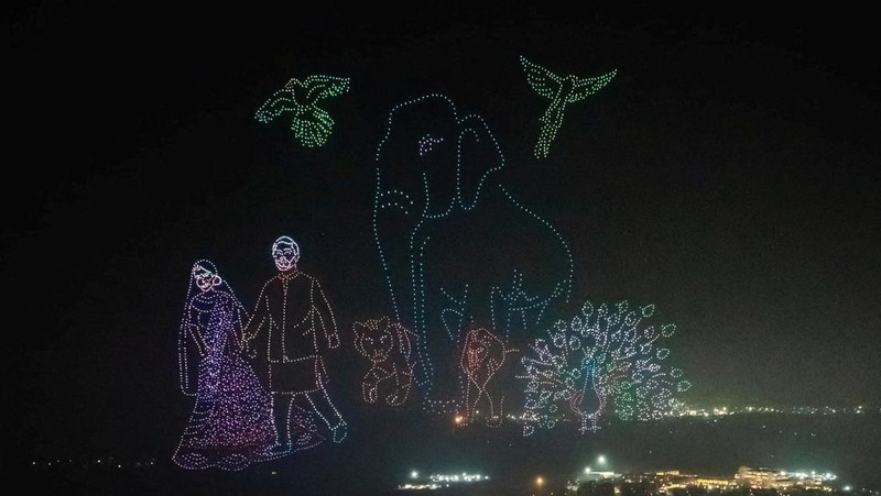Mukesh Ambani, the Chairman of Reliance Industries, Radhika Merchant, Anant Ambani, Nita Ambani, Rihanna, Isha Piramal, Anand Piramal, Shloka Mehta Ambani and Akash Ambani react during pre-wedding celebrations of Anant and Radhika in Jamnagar, Gujarat, India, March 1, 2024. Reliance Industries/Handout via REUTERS THIS IMAGE HAS BEEN SUPPLIED BY A THIRD PARTY. NO RESALES. NO ARCHIVES.