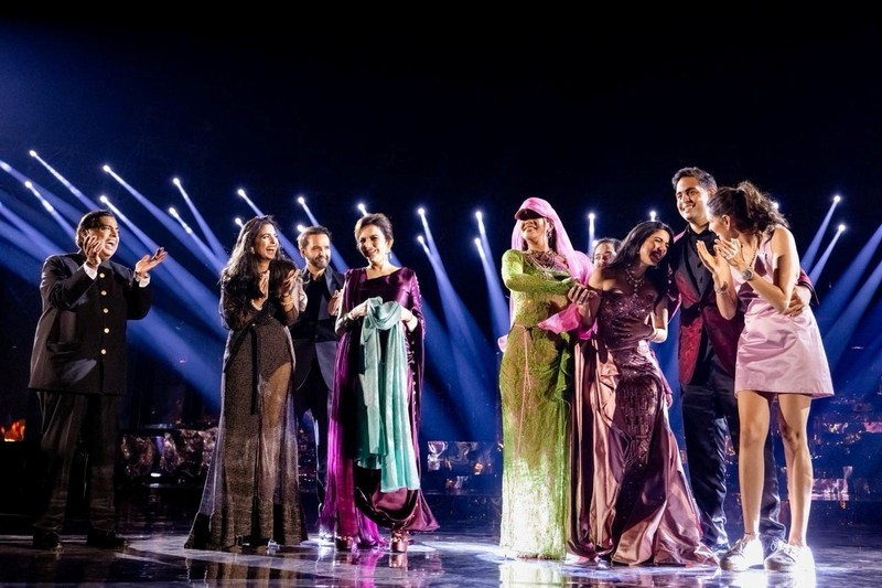 INDIA-AMBANI/MARRIAGE Mukesh Ambani, the Chairman of Reliance Industries, Radhika Merchant, Anant Ambani, Nita Ambani, Rihanna, Isha Piramal, Anand Piramal, Shloka Mehta Ambani and Akash Ambani react during pre-wedding celebrations of Anant and Radhika in Jamnagar, Gujarat, India, March 1, 2024. Reliance Industries/Handout via REUTERS THIS IMAGE HAS BEEN SUPPLIED BY A THIRD PARTY. NO RESALES. NO ARCHIVES.