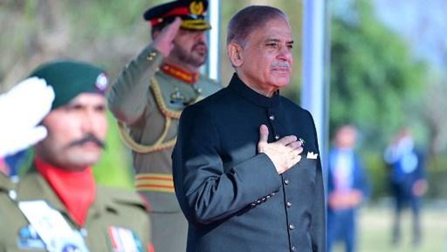 In this handout picture taken and released by Pakistan Prime Minister's Office on March 4, 2024, Pakistan's newly sworn-in Prime Minister Shehbaz Sharif (R) inspects the guard of honor at the Prime Minister House in Islamabad. Shehbaz Sharif was voted in on March 3 as Pakistan's prime minister for a second time, presiding over a shaky alliance that has shut out followers of jailed opposition leader Imran Khan. (Photo by HANDOUT / Pakistan Prime Minister Office / AFP) / -----EDITORS NOTE --- RESTRICTED TO EDITORIAL USE - MANDATORY CREDIT