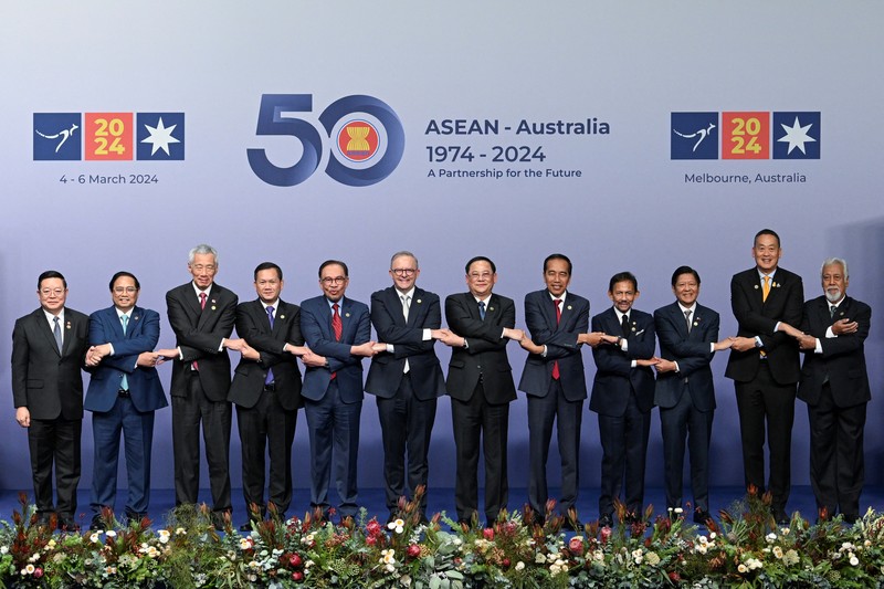 Australia's Prime Minister Anthony Albanese greets Indonesia's President Joko Widodo at the ASEAN-Australia Special Summit, in Melbourne, Australia March 5, 2024. REUTERS/Jaimi Joy