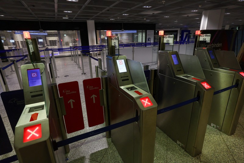 Trains operate outside the central train station as Germany?s GDL train drivers? union begins a 35 hour long strike over a wage dispute with Deutsche Bahn rail operator after rejecting a new tariff offer in Frankfurt, Germany, March 6, 2024.   REUTERS/Kai Pfaffenbach