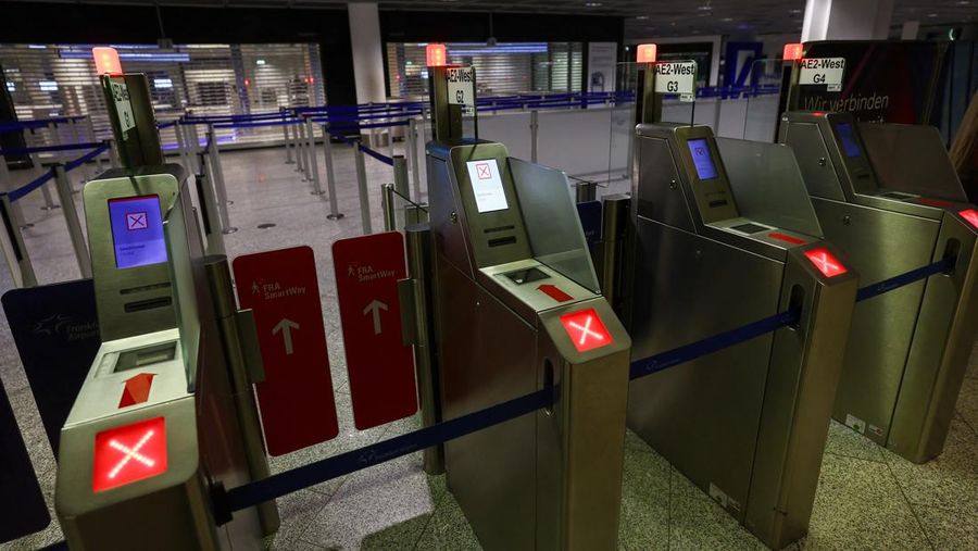 Trains operate outside the central train station as Germany?s GDL train drivers? union begins a 35 hour long strike over a wage dispute with Deutsche Bahn rail operator after rejecting a new tariff offer in Frankfurt, Germany, March 6, 2024.   REUTERS/Kai Pfaffenbach
