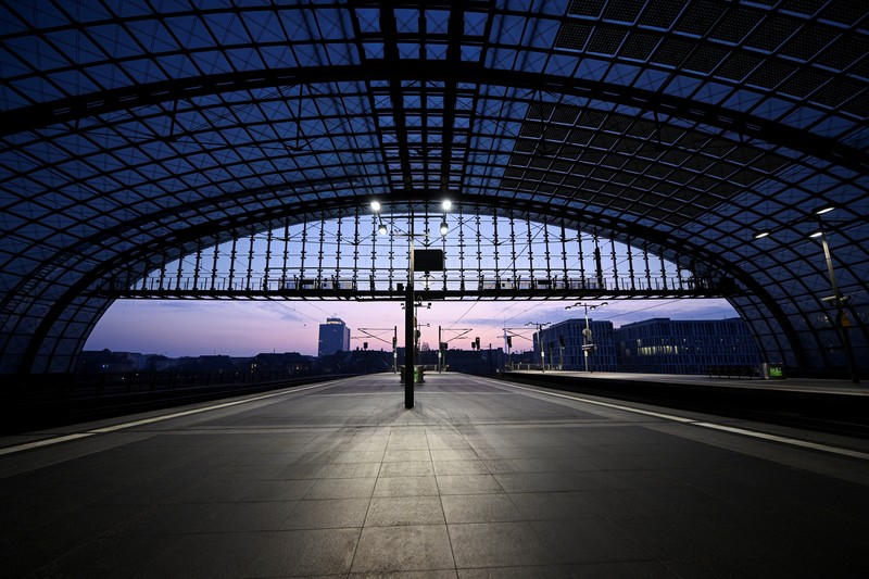 GERMANY-TRAINS/STRIKE Trains operate outside the central train station as Germany?s GDL train drivers? union begins a 35 hour long strike over a wage dispute with Deutsche Bahn rail operator after rejecting a new tariff offer in Frankfurt, Germany, March 6, 2024. REUTERS/Kai Pfaffenbach