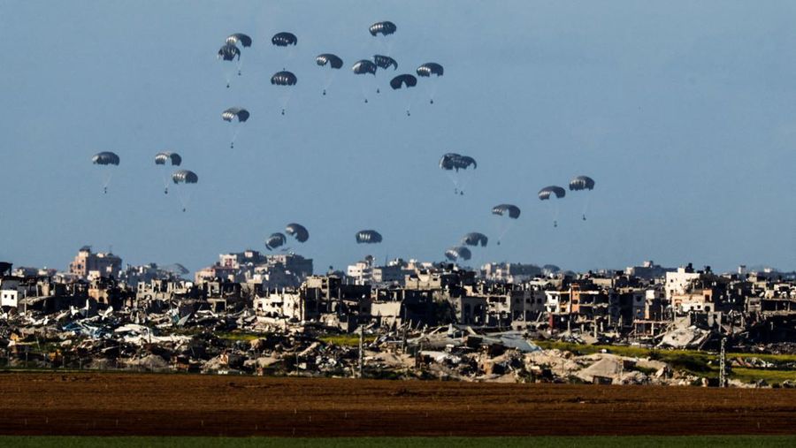 U.S. Air Force drops humanitarian aid for Gaza residents, in this screengrab from a video released on March 5, 2024. US Central Command via X/Handout via REUTERS    THIS IMAGE HAS BEEN SUPPLIED BY A THIRD PARTY