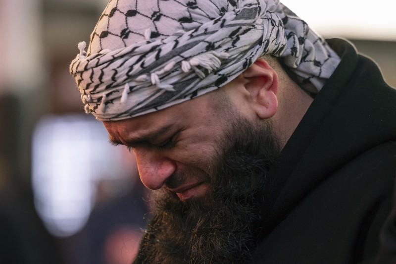 Anggota komunitas Muslim berkumpul untuk salat Tarawih selama bulan Ramadhan di Times Square New York, Minggu, 10 Maret 2024. Anggota komunitas Muslim berkumpul untuk salat Tarawih selama bulan Ramadhan di Times Square New York, Minggu, 10 Maret 2024. (AP Photo/Yuki Iwamura)