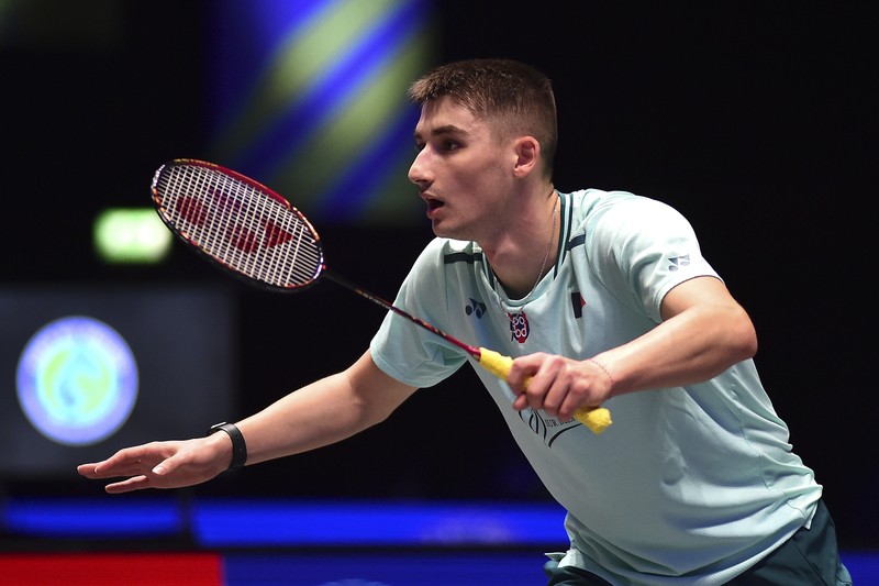 Indonesia's Anthony Sinisuka Ginting plays a shot during the men's singles semi final match against France's Christo Popov at the All England Open Badminton Championships at the Utilita Arena in Birmingham, England, Saturday, March 16, 2024. (AP Photo/Rui Vieira)