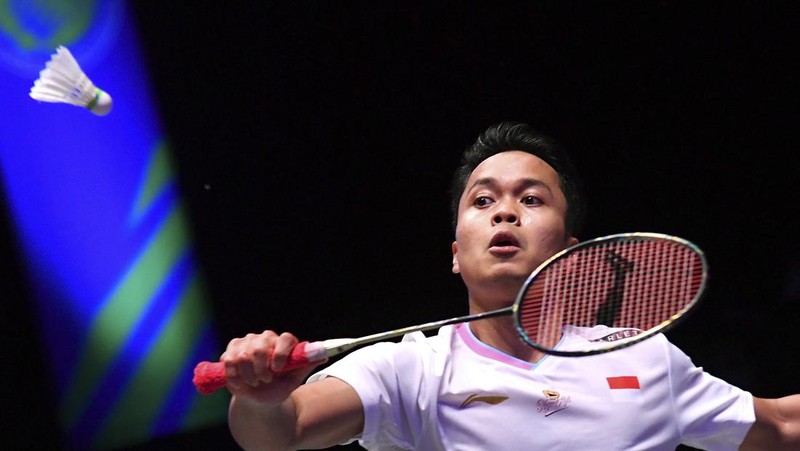 Indonesia's Anthony Sinisuka Ginting plays a shot during the men's singles semi final match against France's Christo Popov at the All England Open Badminton Championships at the Utilita Arena in Birmingham, England, Saturday, March 16, 2024. (AP Photo/Rui Vieira)