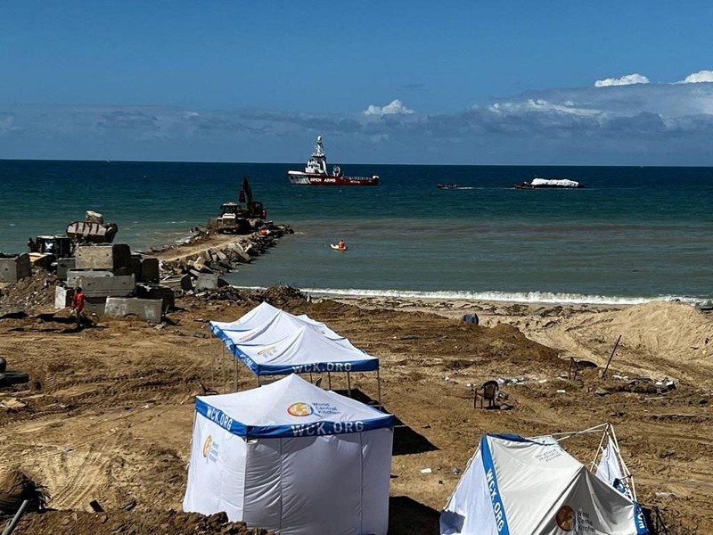 ISRAEL-PALESTINIANS/CYPRUS-AID World Central Kitchen (WCK) barge loaded with food arrives off the Gaza coast, where there is risk of famine after five months of Israel's military campaign, in this handout image released March 15, 2024. Israel Defense Forces/Handout via REUTERS THIS IMAGE HAS BEEN SUPPLIED BY A THIRD PARTY