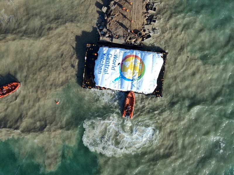 World Central Kitchen (WCK) barge loaded with food arrives off the Gaza coast, where there is risk of famine after five months of Israel's military campaign, in this handout image released March 15, 2024. Israel Defense Forces/Handout via REUTERS    THIS IMAGE HAS BEEN SUPPLIED BY A THIRD PARTY