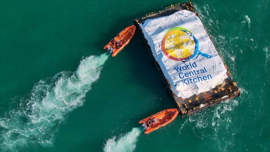 World Central Kitchen (WCK) barge loaded with food arrives off the Gaza coast, where there is risk of famine after five months of Israel's military campaign, in this handout image released March 15, 2024. Israel Defense Forces/Handout via REUTERS    THIS IMAGE HAS BEEN SUPPLIED BY A THIRD PARTY