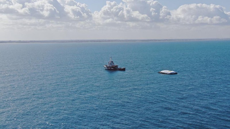 World Central Kitchen (WCK) barge loaded with food arrives off the Gaza coast, where there is risk of famine after five months of Israel's military campaign, in this handout image released March 15, 2024. Israel Defense Forces/Handout via REUTERS    THIS IMAGE HAS BEEN SUPPLIED BY A THIRD PARTY