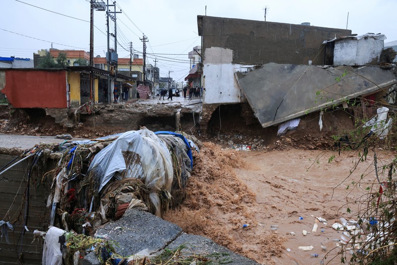 Pemandangan banjir yang melanda kota akibat hujan deras, di Duhok, Irak, 19 Maret 2024. Pemandangan banjir yang melanda kota akibat hujan deras, di Duhok, Irak, 19 Maret 2024. (REUTERS/Ari Jalal)