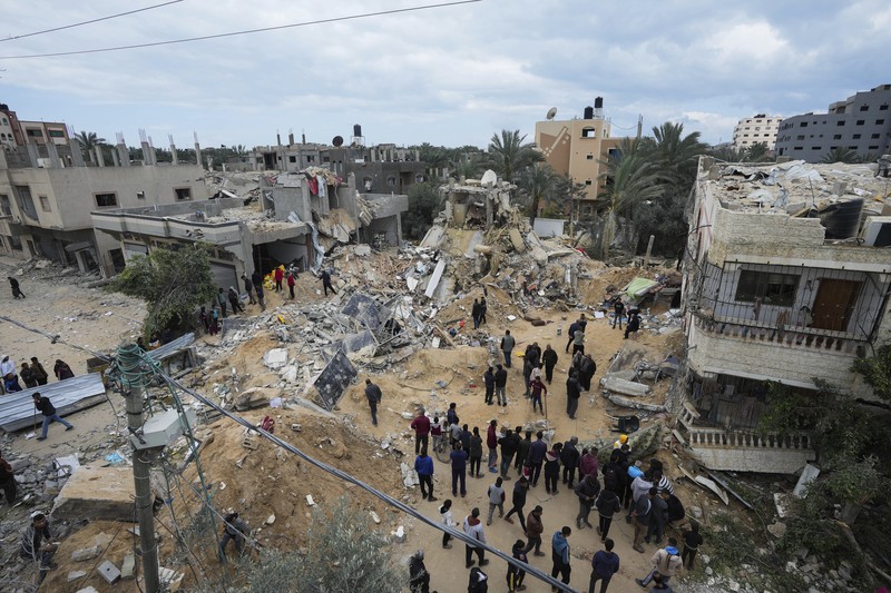 APTOPIX Israel Palestinians An aircraft airdrops humanitarian aid over the northern Gaza Strip, as seen from southern Israel, Sunday, March 24, 2024. (AP Photo/Tsafrir Abayov)
