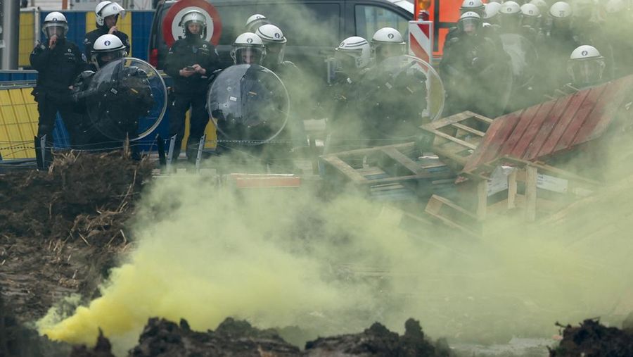 Belgian farmers sit in tractors as they take part in a protest over price pressures, taxes and green regulation, on the day of an EU agriculture ministers' meeting in Brussels, Belgium March 26, 2024. REUTERS/Yves Herman