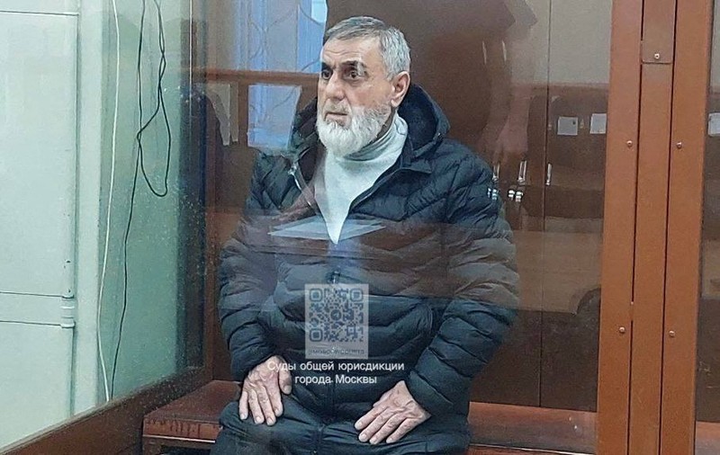 Seorang tersangka penembakan Balai Kota Crocus dikawal dari sebuah van ke markas besar Komite Investigasi Rusia di Moskow, Rusia, dalam gambar diam yang diambil dari video yang dirilis 24 Maret 2024. Seorang tersangka penembakan Balai Kota Crocus dikawal dari sebuah van ke markas besar Komite Investigasi Rusia di Moskow, Rusia, dalam gambar diam yang diambil dari video yang dirilis 24 Maret 2024. (Russian Investigative Committee/Handout via REUTERS)