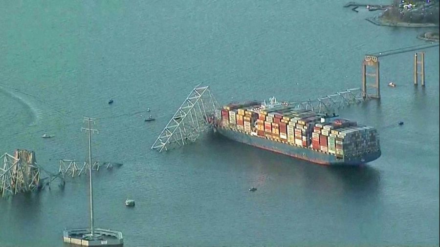 An aerial view of the Dali cargo vessel which crashed into the Francis Scott Key Bridge causing it to collapse in Baltimore, Maryland, U.S., March 26, 2024, in this still image taken from a video.    ABC AFFILIATE WJLA via REUTERS.  NO RESALES. NO ARCHIVES. MANDATORY CREDIT. THIS IMAGE HAS BEEN SUPPLIED BY A THIRD PARTY