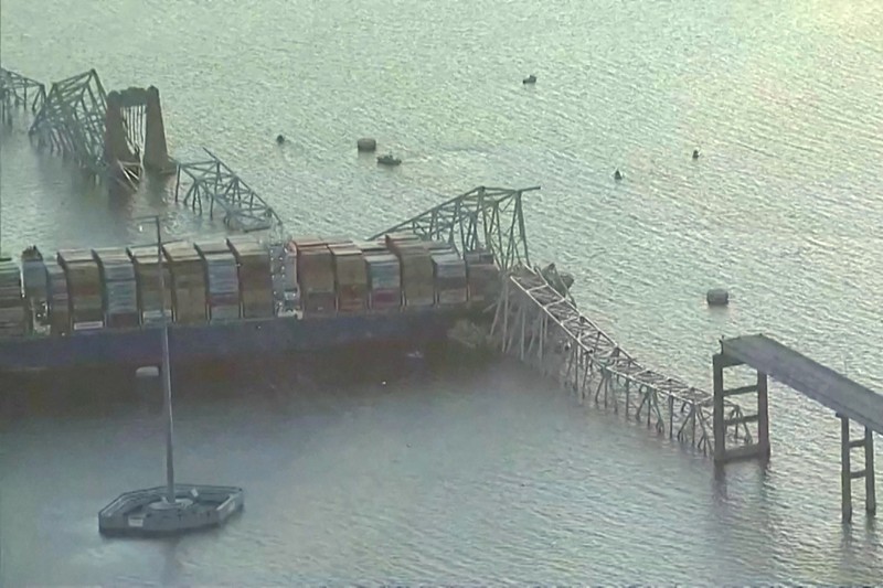 MARYLAND-INCIDENT/BRIDGE An aerial view of the Dali cargo vessel which crashed into the Francis Scott Key Bridge causing it to collapse in Baltimore, Maryland, U.S., March 26, 2024, in this still image taken from a video. ABC AFFILIATE WJLA via REUTERS. NO RESALES. NO ARCHIVES. MANDATORY CREDIT. THIS IMAGE HAS BEEN SUPPLIED BY A THIRD PARTY