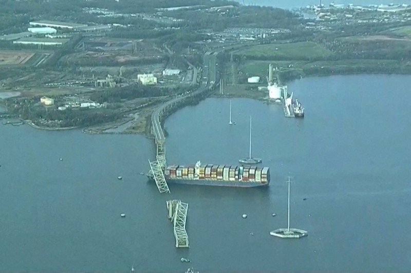 MARYLAND-INCIDENT/BRIDGE An aerial view of the Dali cargo vessel which crashed into the Francis Scott Key Bridge causing it to collapse in Baltimore, Maryland, U.S., March 26, 2024, in this still image taken from a video. ABC AFFILIATE WJLA via REUTERS. NO RESALES. NO ARCHIVES. MANDATORY CREDIT. THIS IMAGE HAS BEEN SUPPLIED BY A THIRD PARTY