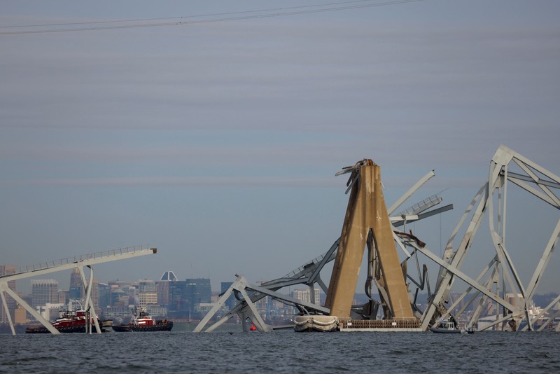 An aerial view of the Dali cargo vessel which crashed into the Francis Scott Key Bridge causing it to collapse in Baltimore, Maryland, U.S., March 26, 2024, in this still image taken from a video.    ABC AFFILIATE WJLA via REUTERS.  NO RESALES. NO ARCHIVES. MANDATORY CREDIT. THIS IMAGE HAS BEEN SUPPLIED BY A THIRD PARTY