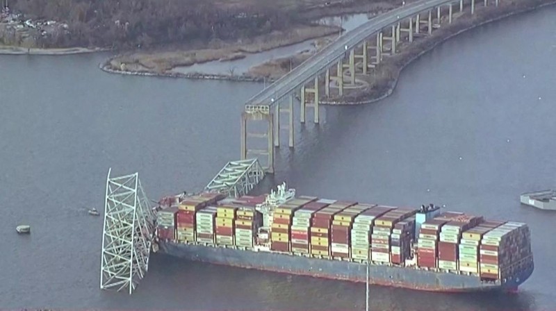 An aerial view of the Dali cargo vessel which crashed into the Francis Scott Key Bridge causing it to collapse in Baltimore, Maryland, U.S., March 26, 2024, in this still image taken from a video.    ABC AFFILIATE WJLA via REUTERS.  NO RESALES. NO ARCHIVES. MANDATORY CREDIT. THIS IMAGE HAS BEEN SUPPLIED BY A THIRD PARTY