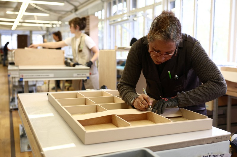 Trunks from the Louis Vuitton collection are displayed in the trunks museum at the Louis Vuitton workshops in Asnieres-sur-Seine near Paris, France, March 27, 2024. REUTERS/Stephanie Lecocq