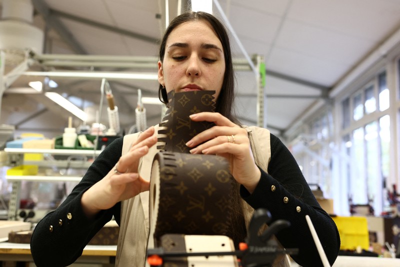 Trunks from the Louis Vuitton collection are displayed in the trunks museum at the Louis Vuitton workshops in Asnieres-sur-Seine near Paris, France, March 27, 2024. REUTERS/Stephanie Lecocq