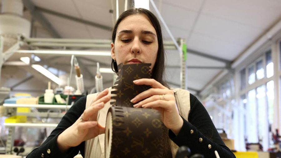 Trunks from the Louis Vuitton collection are displayed in the trunks museum at the Louis Vuitton workshops in Asnieres-sur-Seine near Paris, France, March 27, 2024. REUTERS/Stephanie Lecocq
