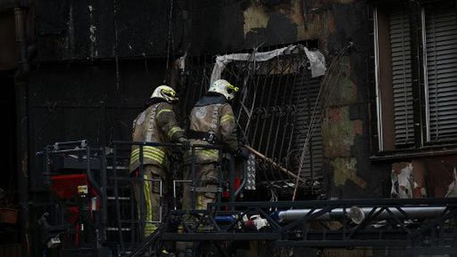 Firefighters intervene at the site of a fire in a residential building in Istanbul on April 2, 2024. A fire killed at least 29 people in a 16-storey residential building in Istanbul on April 2, the governor of Turkey's economic capital said, updating an earlier toll of 15 dead and eight hurt. The blaze had broken out during construction work in the first and second floors below ground, which housed a nightclub, governor Davut Gul told reporters. (Photo by OZAN KOSE / AFP)