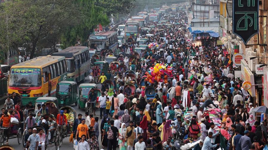 People get into a ferry at the Sadarghat Ferry Terminal to go home to celebrate Eid al-Fitr with their family, in Dhaka, Bangladesh, April 8, 2024. REUTERS/Mohammad Ponir Hossain