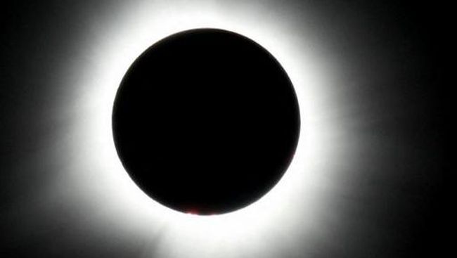 HOULTON, MAINE - APRIL 08: The sun reaches totality during the eclipse on April 08, 2024 in Houlton, Maine. Millions of people have flocked to areas across North America that are in the 
