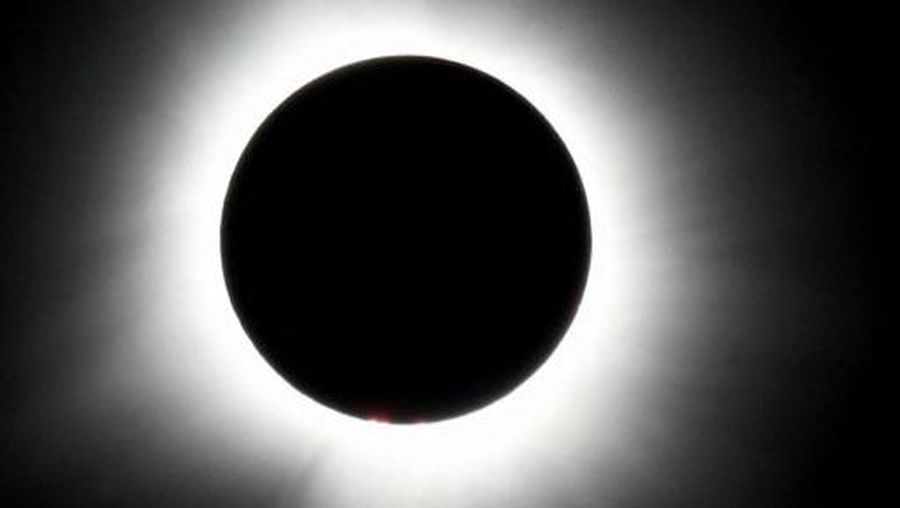 HOULTON, MAINE - APRIL 08: The sun reaches totality during the eclipse on April 08, 2024 in Houlton, Maine. Millions of people have flocked to areas across North America that are in the