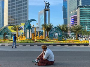 Sisi Lain Lebaran di Jakarta: Foto-foto di Jalan hingga Berburu Bakso