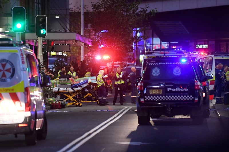 AUSTRALIA-CRIME/ Emergency service workers are seen near Bondi Junction after multiple people were stabbed inside the Westfield Bondi Junction shopping centre in Sydney, April 13, 2024.AAP Image/Steven Saphore via REUTERS ATTENTION EDITORS - THIS IMAGE WAS PROVIDED BY A THIRD PARTY. NO RESALES. NO ARCHIVE. AUSTRALIA OUT. NEW ZEALAND OUT. NO COMMERCIAL OR EDITORIAL SALES IN NEW ZEALAND. NO COMMERCIAL OR EDITORIAL SALES IN AUSTRALIA.