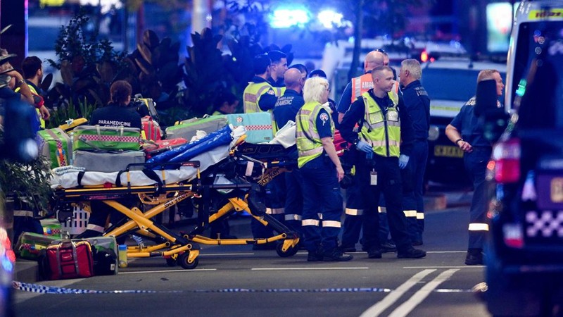 Emergency service workers are seen near Bondi Junction after multiple people were stabbed inside the Westfield Bondi Junction shopping centre in Sydney, April 13, 2024.AAP Image/Steven Saphore via REUTERS   ATTENTION EDITORS - THIS IMAGE WAS PROVIDED BY A THIRD PARTY. NO RESALES. NO ARCHIVE. AUSTRALIA OUT. NEW ZEALAND OUT. NO COMMERCIAL OR EDITORIAL SALES IN NEW ZEALAND. NO COMMERCIAL OR EDITORIAL SALES IN AUSTRALIA.