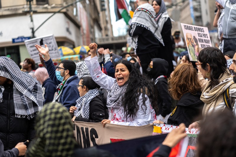 Demonstrators attend a protest demanding a ceasefire and the end of Israeli attacks on Gaza, during the ongoing conflict between Israel and the Palestinian Islamist group Hamas, in New York City, U.S., April 12, 2024. REUTERS/Jeenah Moon