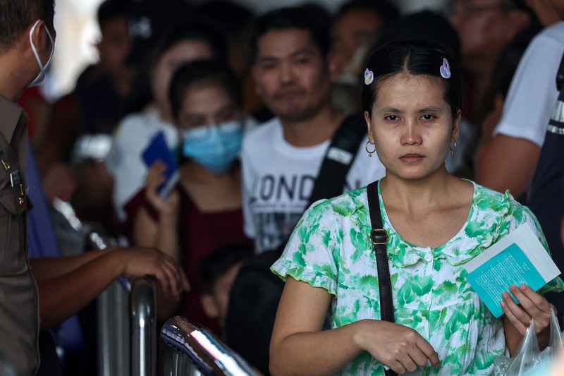 Military personnel stand guard as hundreds of refugees crossed over the river frontier between Myanmar and Thailand on Friday following the fall of a strategic border town to rebels fighting Myanmar's military junta, in Mae Sot, Tak province, Thailand, April 13, 2024. REUTERS/Athit Perawongmetha
