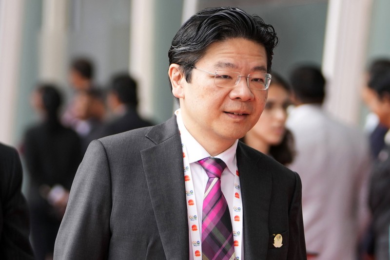 PM Singapura Lee Hsien Loong (kiri) dan Wakil PM Singapura Lawrence Wong (kanan)