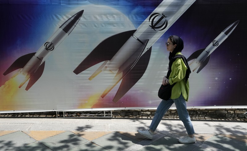 ISRAEL-PALESTINIANS/IRAN An anti-Israel billboard with a picture of Iranian missiles is seen on a street in Tehran, Iran April 19, 2024. Majid Asgaripour/WANA (West Asia News Agency) via REUTERS ATTENTION EDITORS - THIS IMAGE HAS BEEN SUPPLIED BY A THIRD PARTY. ATTENTION EDITORS - THIS PICTURE WAS PROVIDED BY A THIRD PARTY.