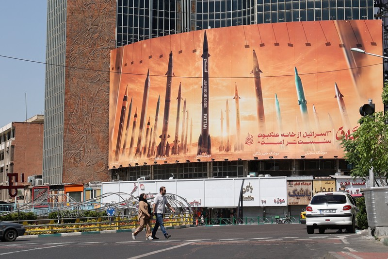 ISRAEL-PALESTINIANS/IRAN An anti-Israel billboard with a picture of Iranian missiles is seen on a street in Tehran, Iran April 19, 2024. Majid Asgaripour/WANA (West Asia News Agency) via REUTERS ATTENTION EDITORS - THIS IMAGE HAS BEEN SUPPLIED BY A THIRD PARTY. ATTENTION EDITORS - THIS PICTURE WAS PROVIDED BY A THIRD PARTY.