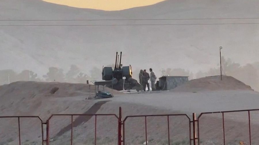 Military personnel stand guard at a nuclear facility in the Zardanjan area of Isfahan, Iran, April 19, 2024, in this screengrab taken from video.  WANA (West Asia News Agency) via REUTERS   ATTENTION EDITORS - THIS PICTURE WAS PROVIDED BY A THIRD PARTY. IRAN OUT. NO COMMERCIAL OR EDITORIAL SALES IN IRAN