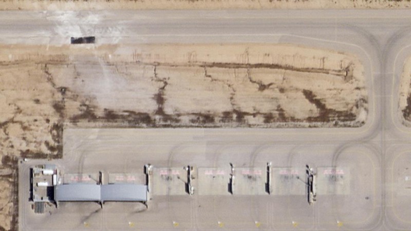 This satellite photo taken by Planet Labs PBC shows a repaired taxiway after Iranian attack on Israel's Nevatim air base Friday, April 19, 2024. An Iranian attack on an Israeli desert air base as part of Tehran's unprecedented assault on the country damaged a taxiway, a satellite image analyzed by The Associated Press on Saturday shows. (Planet Labs PBC via AP)