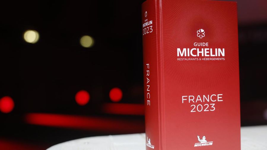 The 2023 Michelin Guide sits on a table before the stars ceremony in Strasbourg eastern France, Monday, March 6, 2023. Restaurants will be honored with the gastronomic world's most coveted prize Monday: a three-star Michelin rating.(AP Photo/Jean-Francois Badias)