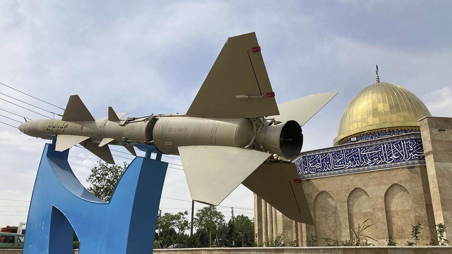 Burn marks surround what analysts identify as a radar system for a Russian-made S-300 missile battery, center, near an international airport and air base is seen in Isfahan, Iran, Monday, April 22, 2024. Satellite photos taken Monday suggest an apparent Israeli retaliatory strike targeting Iran's central city of Isfahan hit a radar system for a Russian-made air defense battery, contradicting repeated denials by officials in Tehran in the time since the assault. (Planet Labs PBC via AP)