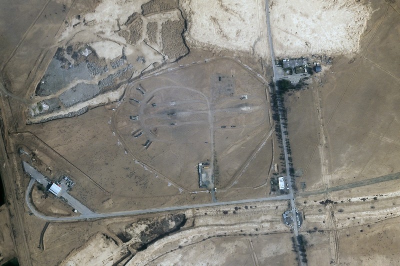 Burn marks surround what analysts identify as a radar system for a Russian-made S-300 missile battery, center, near an international airport and air base is seen in Isfahan, Iran, Monday, April 22, 2024. Satellite photos taken Monday suggest an apparent Israeli retaliatory strike targeting Iran's central city of Isfahan hit a radar system for a Russian-made air defense battery, contradicting repeated denials by officials in Tehran in the time since the assault. (Planet Labs PBC via AP)