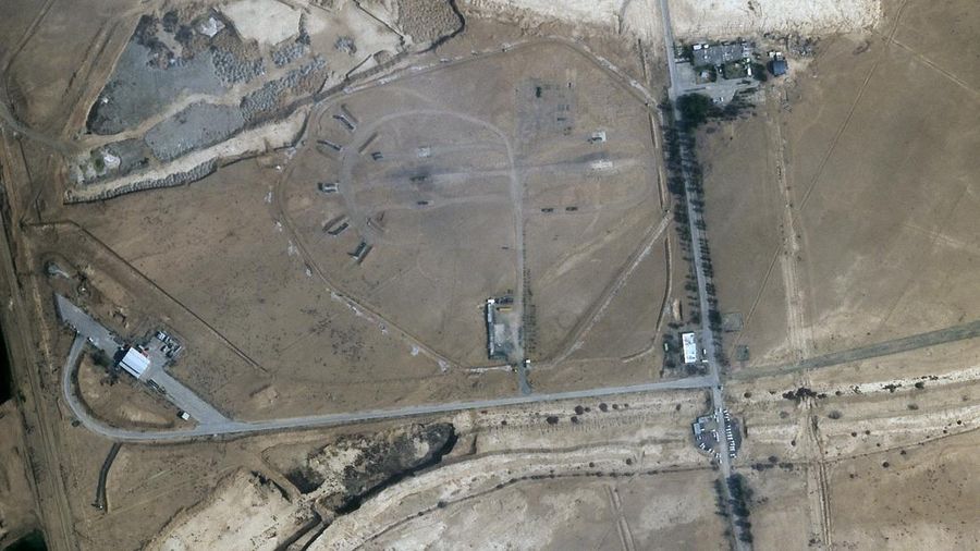 Burn marks surround what analysts identify as a radar system for a Russian-made S-300 missile battery, center, near an international airport and air base is seen in Isfahan, Iran, Monday, April 22, 2024. Satellite photos taken Monday suggest an apparent Israeli retaliatory strike targeting Iran's central city of Isfahan hit a radar system for a Russian-made air defense battery, contradicting repeated denials by officials in Tehran in the time since the assault. (Planet Labs PBC via AP)
