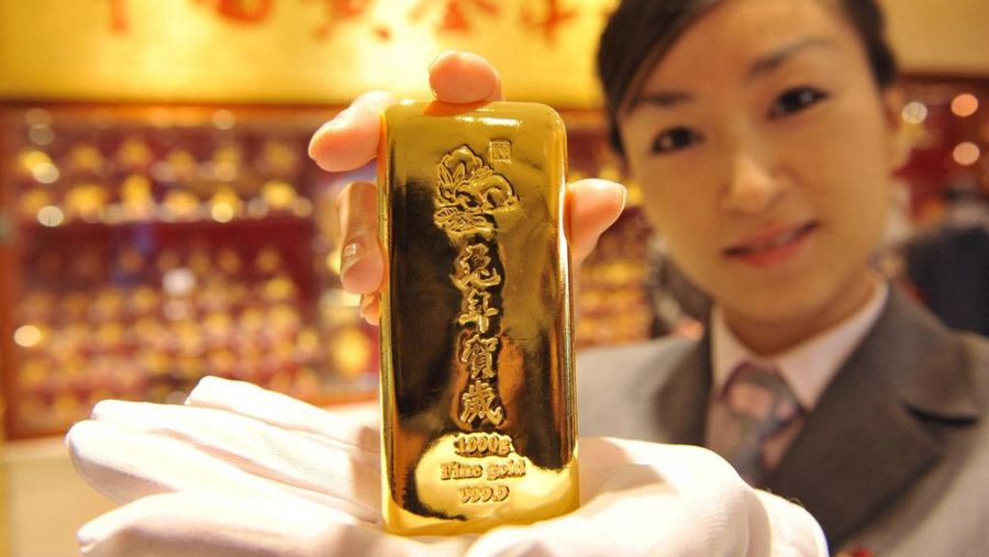 Ilustrasi emas China. (AFP)