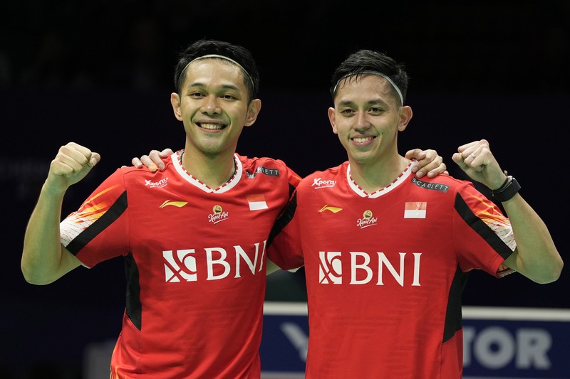 Pebulutangkis Ganda Putra Indonesia Fajar Alfian dan Rian Ardianto saat berlaga di Thomas Cup. (AP/Ng Han Guan) Pebulutangkis Ganda Putra Indonesia Fajar Alfian dan Rian Ardianto saat berlaga di Thomas Cup. (AP/Ng Han Guan)