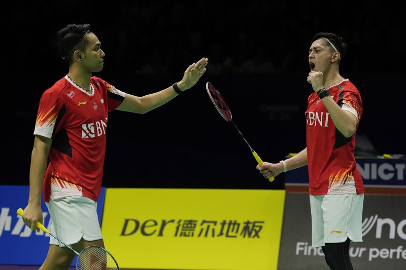 Pebulutangkis Ganda Putra Indonesia Fajar Alfian dan Rian Ardianto saat berlaga di Thomas Cup. (AP/Ng Han Guan) Pebulutangkis Ganda Putra Indonesia Fajar Alfian dan Rian Ardianto saat berlaga di Thomas Cup. (AP/Ng Han Guan)