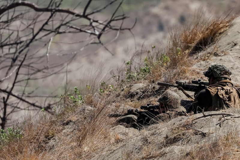 Tentara AS dan Filipina saat latihan militer gabungan tahunan di Laoag, Ilocos Norte, Filipina, Senin (6/5/2024). (REUTERS/Eloisa Lopez) Tentara AS dan Filipina saat latihan militer gabungan tahunan di Laoag, Ilocos Norte, Filipina, Senin (6/5/2024). (REUTERS/Eloisa Lopez)